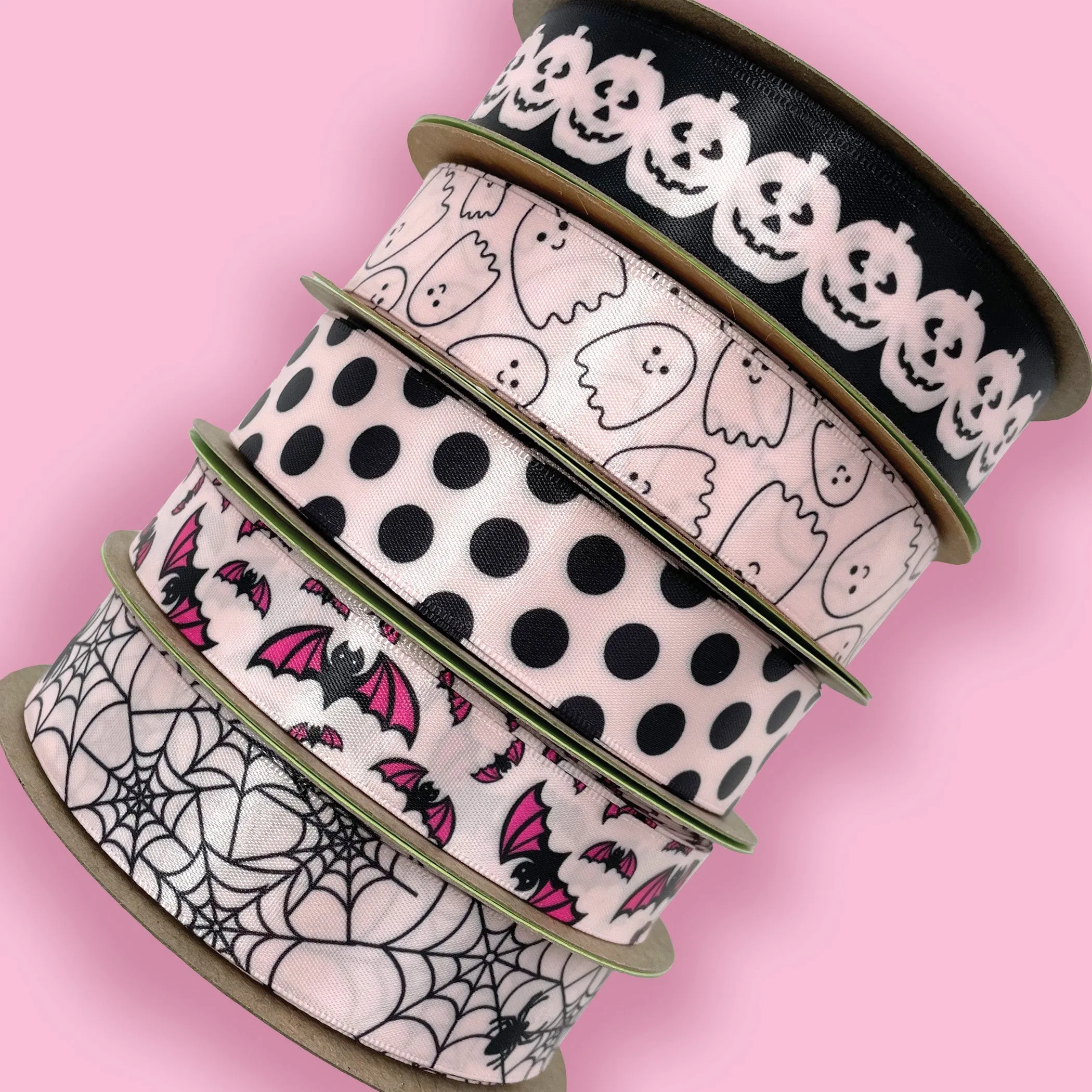Ghost ribbon cute ghost with a happy smile outlined in black printed on 7/8" light pink satin