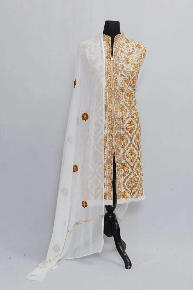 White Colour Cotton Suit With Rich Jaal Of Kashmiri Embroidery Known For Its Unique Design.